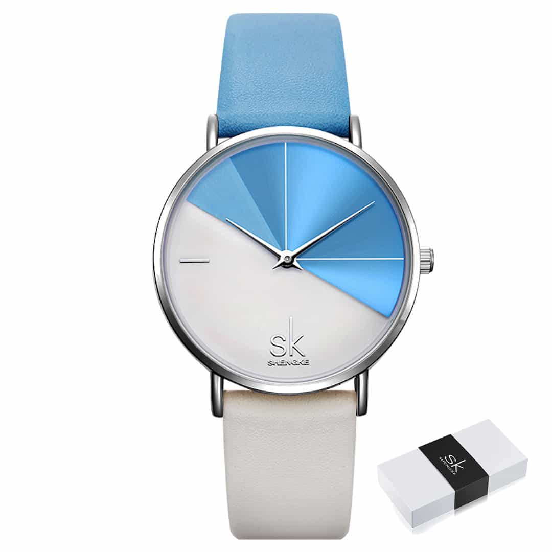 Ženska ročna ura SK Shengke DuoTone Leather Blue z elegantnim modrim in belim usnjenim paščkom.